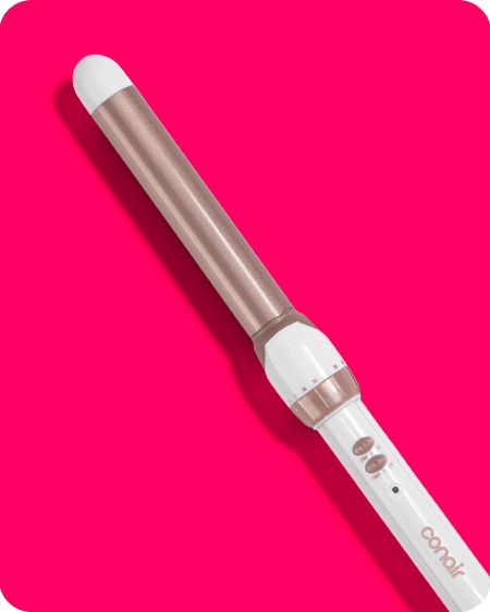 Conair curling wand on pink background