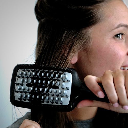 Woman using the BC7N hot brush