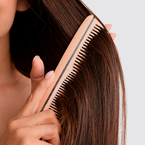 Comb through your clean, dry hair.