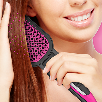 Woman using the BC120 hot brush