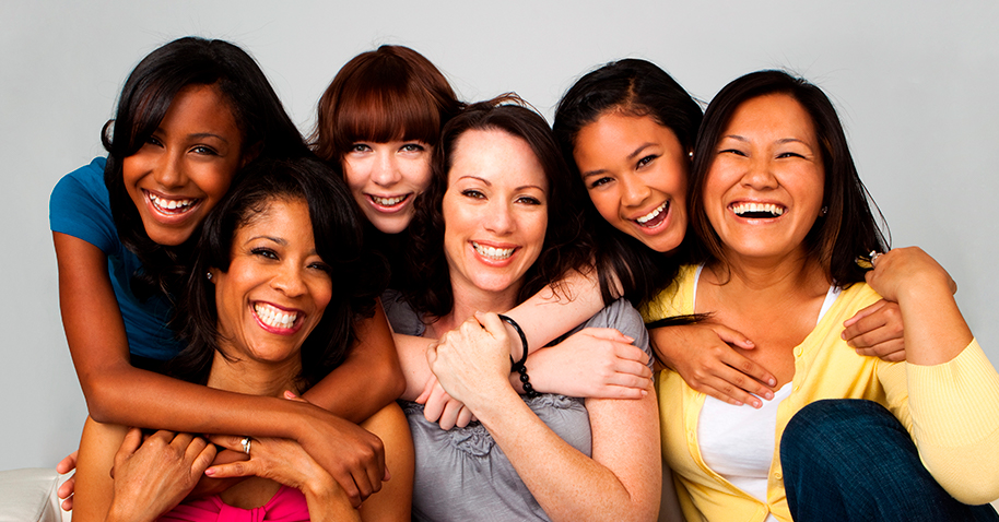 A diverse group of women with thick natural hair.