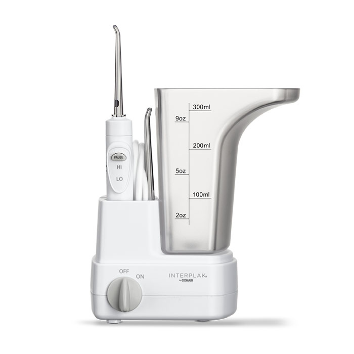 Irrigador dental compacto